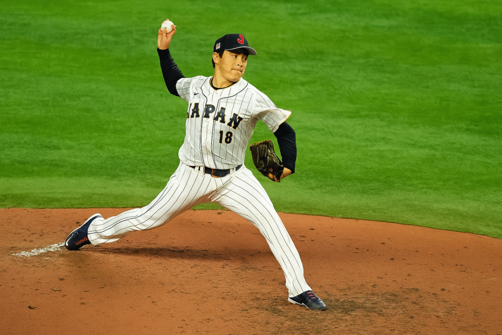 Yoshinobu Yamamoto pitching during Game 6 of the 2025 World Series in Toronto.