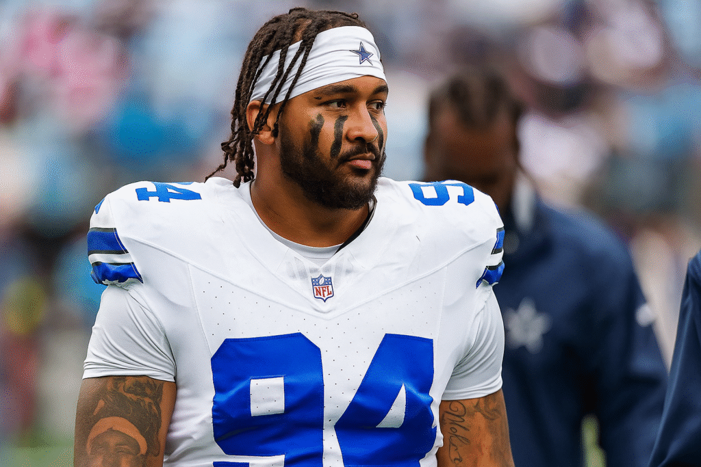 Marshawn Kneeland in Dallas Cowboys uniform during pregame warmups.