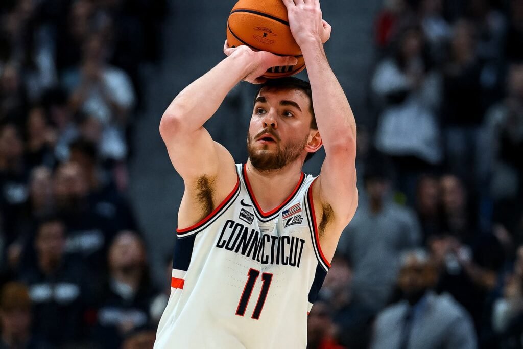 Alex Karaban shoots a clutch three during UConn vs Florida at the Jimmy V Classic