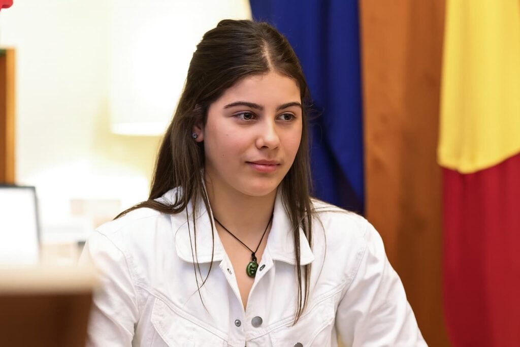 Twelve-year-old Flossie Brodribb smiles while addressing media about the social media ban.