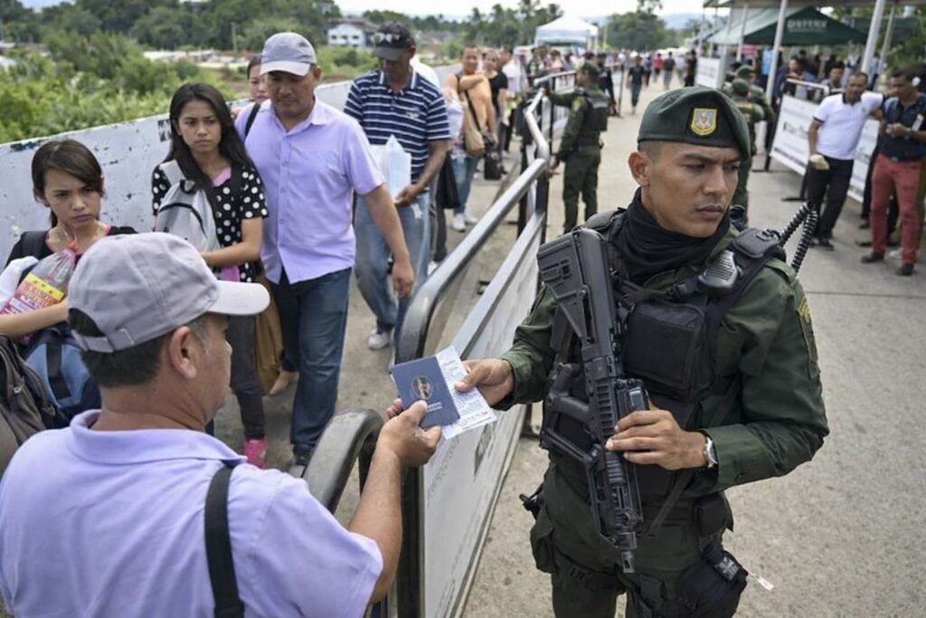 Armed police patrolling streets of Caracas at night
