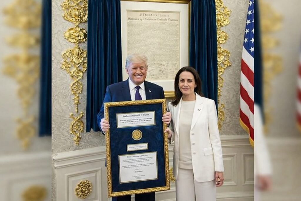 Maria Corina Machado presents her Nobel Peace Prize medal to Donald Trump at the White House.