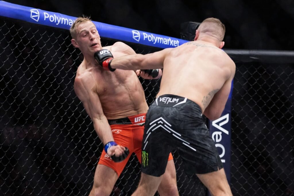 Justin Gaethje landing a right hand on Paddy Pimblett at UFC 324