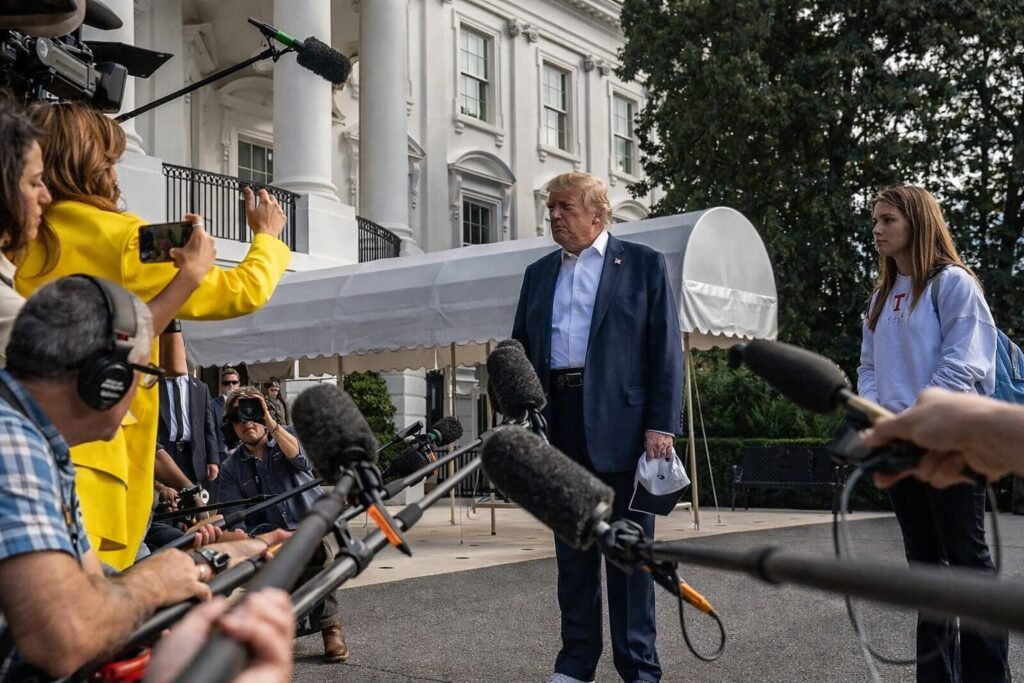 President Donald Trump speaking to reporters on the South Lawn of the White House