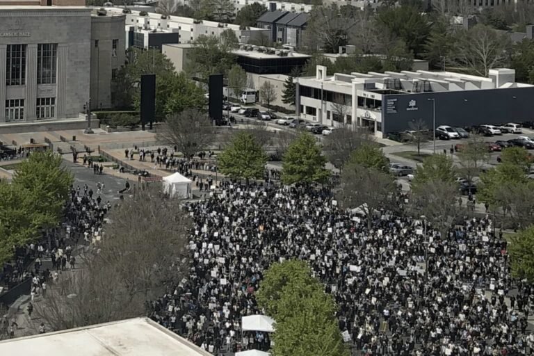 Aerial view of hundreds of thousands of No Kings protesters filling the streets of Chicago's Grant Park on March 28 2026 during the largest single day of protest in American history with eight to nine million participants nationwide