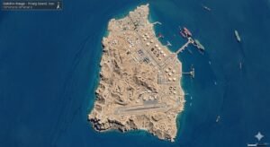 Satellite image of Iran's Kharg Island showing military fortifications and oil terminal infrastructure as U.S. officials confirm the Pentagon has war-gamed a Marine amphibious assault to seize the island amid ongoing U.S. Iran war negotiations and April 6 deadline