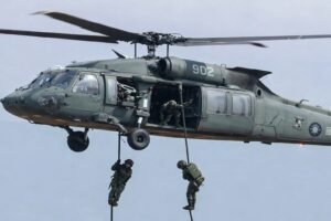 US special forces rescue helicopter flying over Iran terrain during operation to extract missing F-15E weapons systems officer on Easter Sunday April 5 2026