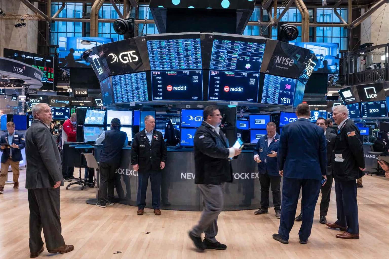 New York Stock Exchange traders cheering as Dow Jones surges 1325 points best single day in year after US Iran ceasefire announced April 8 2026