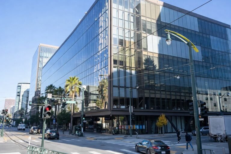 OpenAI logo on company headquarters in San Francisco where 20-year-old suspect was arrested after threatening to burn building April 10 2026