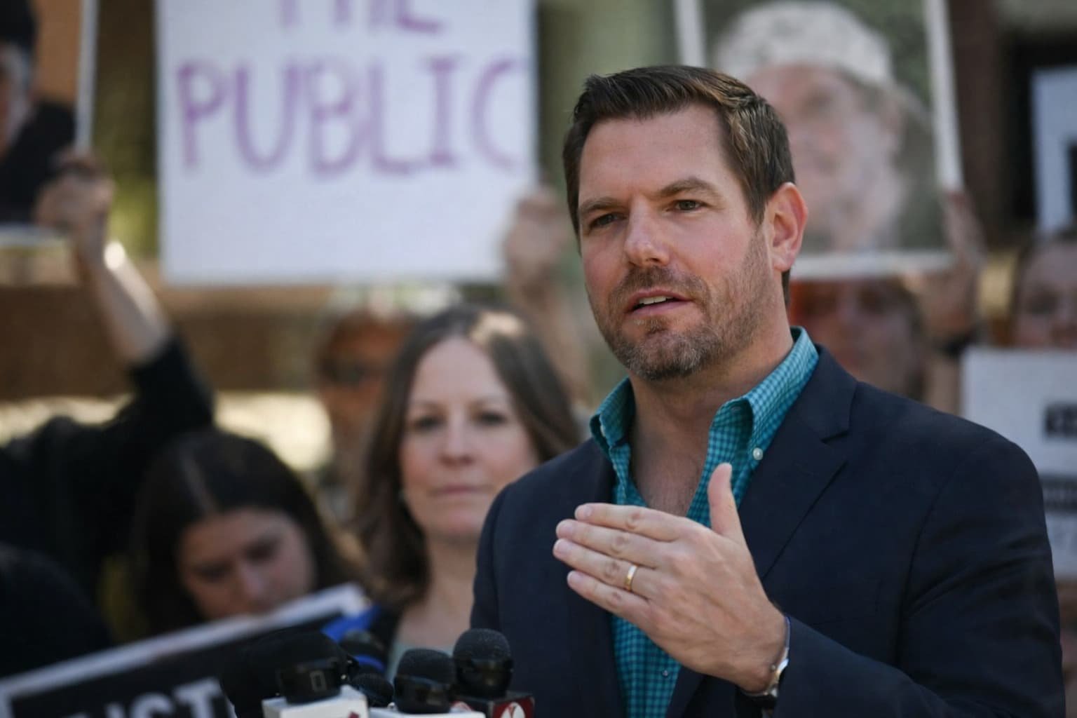 Congressman Eric Swalwell speaking at town hall before resigning from Congress amid sexual misconduct allegations April 2026
