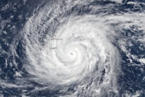 Super Typhoon Sinlaku satellite image over Pacific Ocean approaching Guam and Northern Mariana Islands April 2026