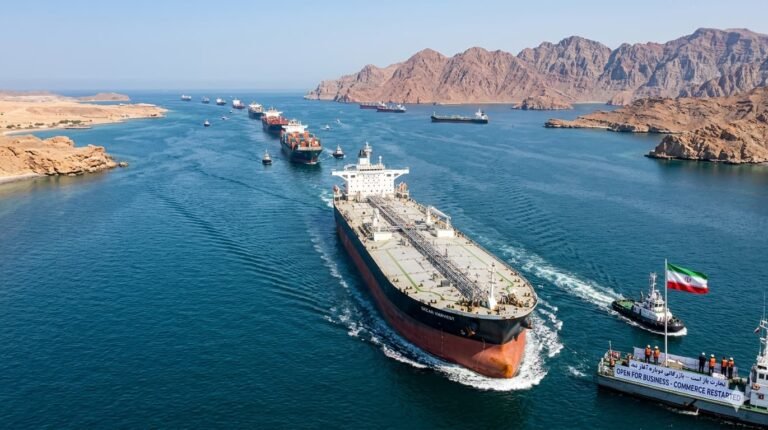 Oil tanker passing through the reopened Strait of Hormuz after Iran announces commercial shipping open April 18 2026