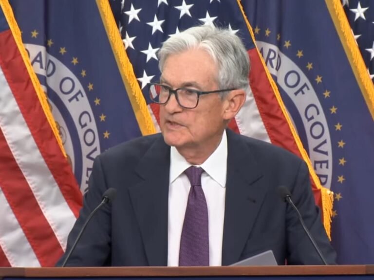 Federal Reserve Chair Jerome Powell speaking at press conference after FOMC vote to hold benchmark interest rates steady in 8-4 split decision April 29 2026