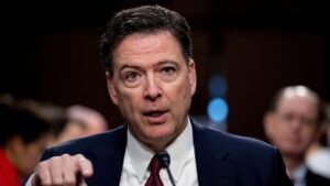 James Comey official FBI portrait as former director faces second federal indictment for threatening the president after first case dismissed on procedural grounds 2026