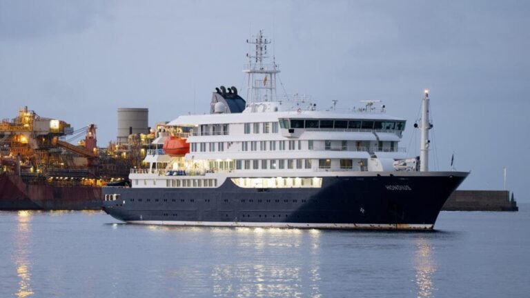 Dutch-flagged expedition cruise ship MV Hondius anchored outside Tenerife in Canary Islands as hantavirus outbreak sends 17 passengers ashore for controlled disembarkation May 10 2026