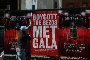 Boycott the Bezos Met Gala protest posters plastered on Manhattan bus stops near Metropolitan Museum of Art as celebrities skip 2026 gala over Jeff Bezos ten million dollar sponsorship