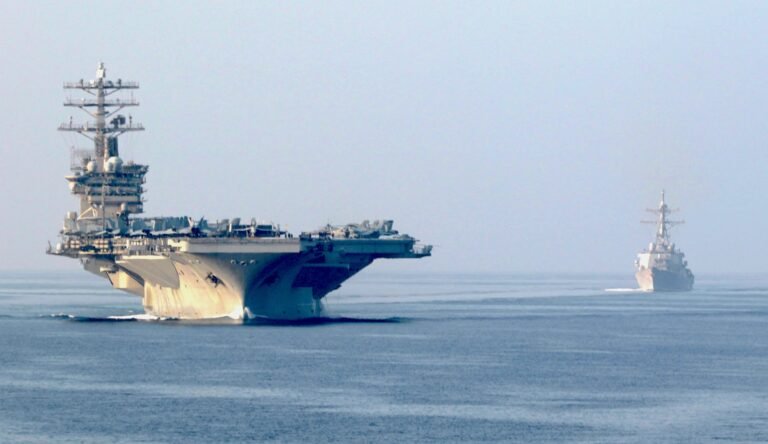 US Navy warship in Arabian Sea as Pentagon prepares to escort commercial vessels through Strait of Hormuz following Trump announcement of Monday guidance operation May 2026