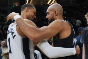 Victor Wembanyama and Stephon Castle celebrating San Antonio Spurs Game 6 closeout win over Minnesota Timberwolves advancing to 2026 Western Conference Finals