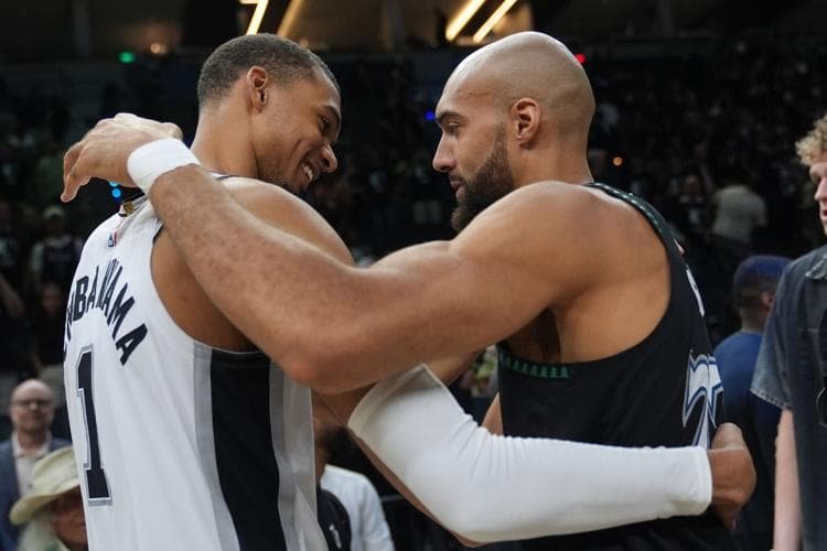 Victor Wembanyama and Stephon Castle celebrating San Antonio Spurs Game 6 closeout win over Minnesota Timberwolves advancing to 2026 Western Conference Finals