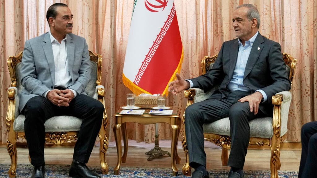 Pakistani Field Marshal Asim Munir meeting with Iranian President Masoud Pezeshkian in Tehran representing mediation that produced US-Iran 60-day ceasefire framework agreement May 2026