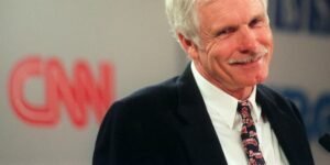 Ted Turner smiling at CNN headquarters in Atlanta as media mogul who founded world's first 24-hour news network dies peacefully at age 87 surrounded by family May 6 2026