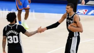 Victor Wembanyama celebrating after hitting logo three-pointer in overtime to tie Game 1 of 2026 Western Conference Finals against OKC Thunder