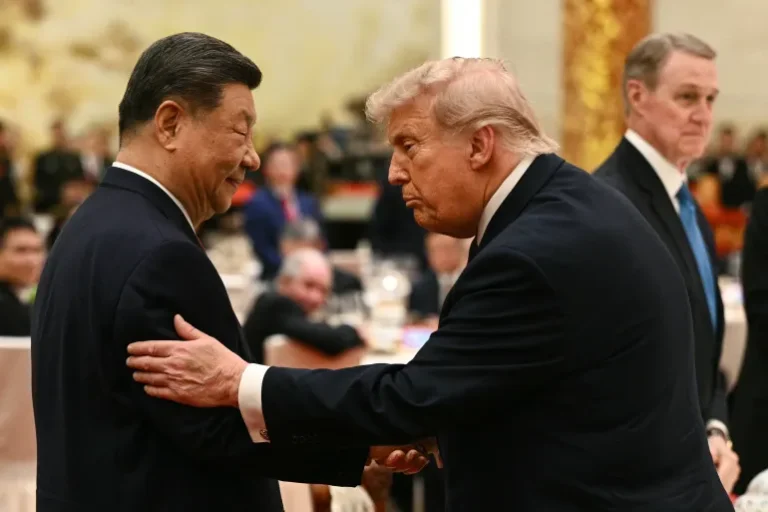 Trump and Xi Jinping shaking hands at Great Hall of the People Beijing summit May 2026