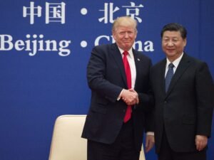 Trump and Xi Jinping handshake at previous summit as May 14 Beijing meeting becomes most important diplomatic event for oil prices and Iran war resolution in 2026