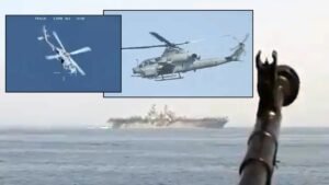 US Navy attack helicopter over Strait of Hormuz after sinking six Iranian fast attack boats during Project Freedom Day One escort operation May 4 2026