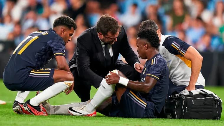 Vinicius Jr clutching knee during Real Madrid match as Brazil's star forward races against injury timeline to be fit for 2026 FIFA World Cup opening June 11 in North America