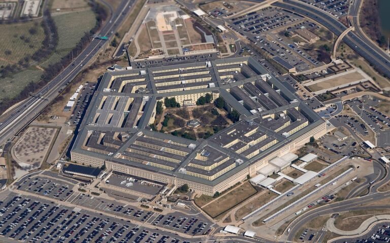 Pentagon building in Washington DC as Department of Defense releases over 160 previously classified UFO UAP files including Apollo mission footage and FBI records May 8 2026