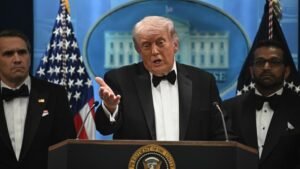 President Trump at White House podium announcing pause of Project Freedom Strait of Hormuz escort operation to allow time for Iran deal to be finalized May 5 2026