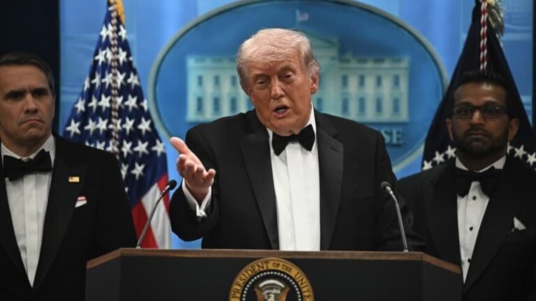 President Trump at White House podium announcing pause of Project Freedom Strait of Hormuz escort operation to allow time for Iran deal to be finalized May 5 2026