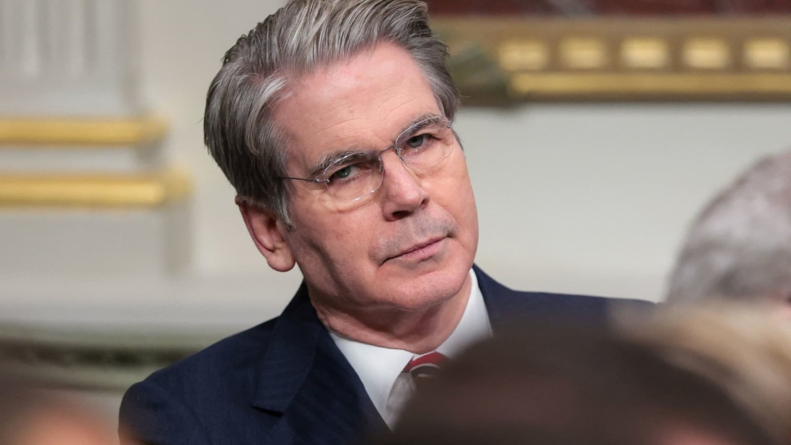 Treasury Secretary Scott Bessent holding proposed $250 bill mock-up featuring President Trump at White House Brady Briefing Room press conference May 28 2026