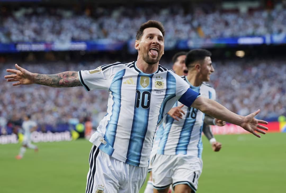 Lionel Messi celebrating hat-trick goal for Argentina against Algeria at GEHA Field Arrowhead Stadium Kansas City FIFA World Cup 2026 June 16