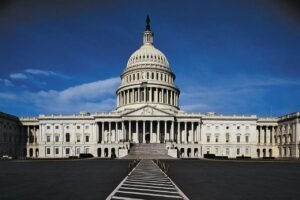State capitol building representing legal battle over federal government conditioning homeland security grants on election administration changes in 2026